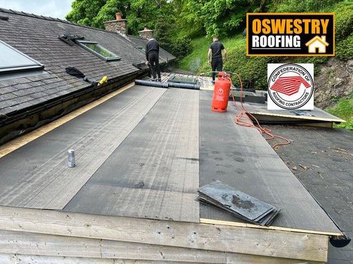 Oswestry Roofing Services New natural slate lean-to roof installed on a stone outbuilding for roofing work in Oswestry