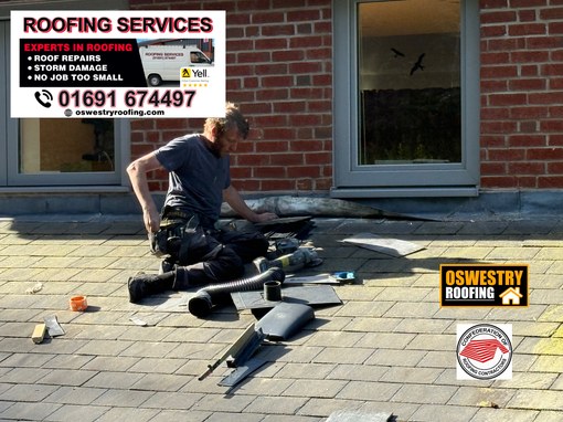 Oswestry Roofing Services Natural slate roof completed around two fitted roof windows with lead flashing for roofing work in Oswestry