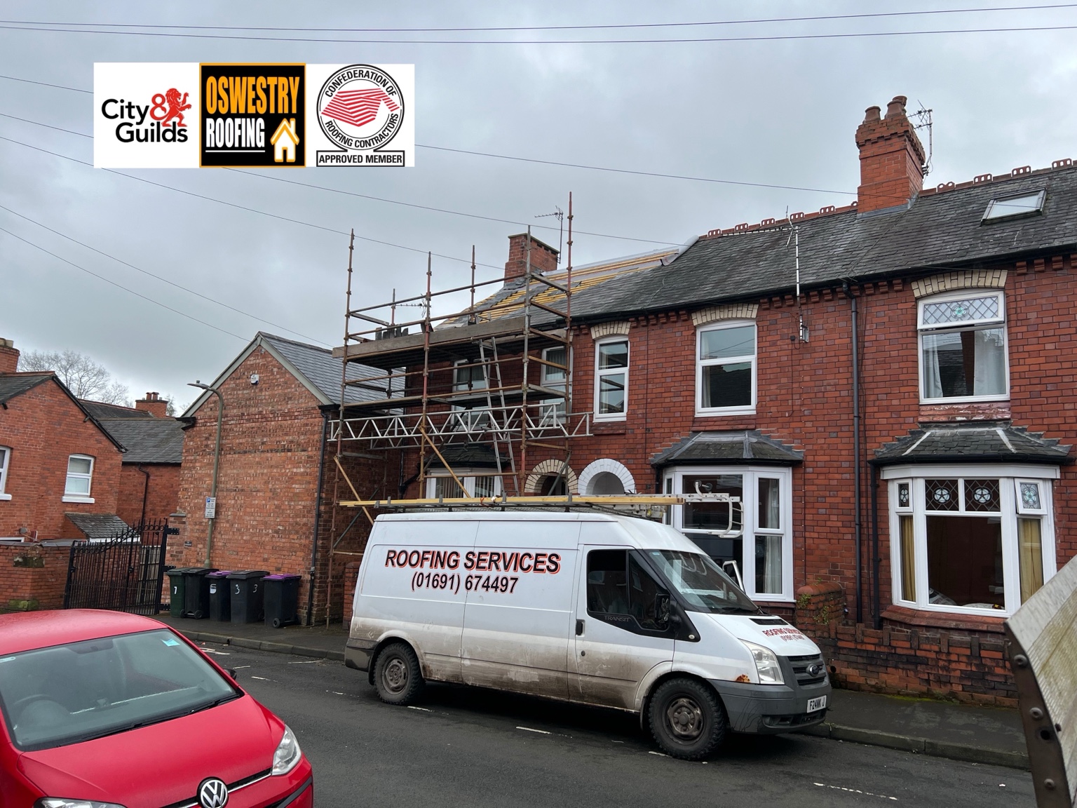 Oswestry Roofing Services Black guttering, white soffits and fascia boards fitted around a tiled entrance canopy for roofing work in Oswestry