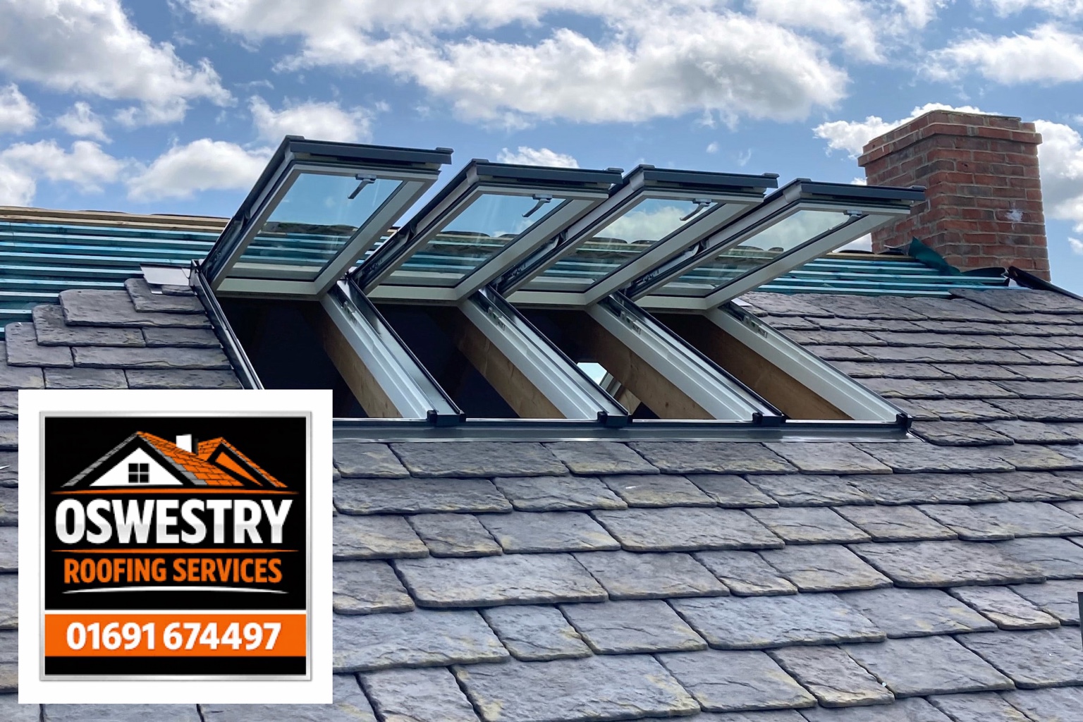 Four roof windows fitted in a slate roof, with Oswestry Roofing Services branding