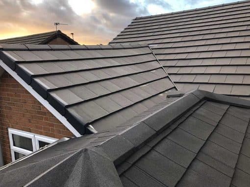 Oswestry Roofing Services Completed interlocking tiled roof with neatly finished hips, valleys and verge caps for roofing work in Oswestry