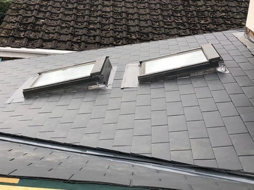 Oswestry Roofing Services Natural slate roof completed around two fitted roof windows with lead flashing for roofing work in Oswestry
